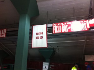 Fenway Park and a Boston Red Sox banner for the ballpark's 100 anniversary.